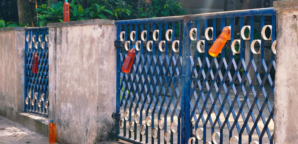 Bottles hanging to the gates